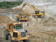 Preparing the site with heavy machinery