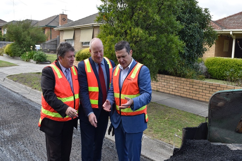 Three gentlemen at the launch of the Hume rubbish to roads project