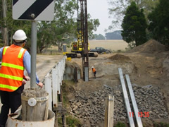 Construction workers building new Goads Road Bridge